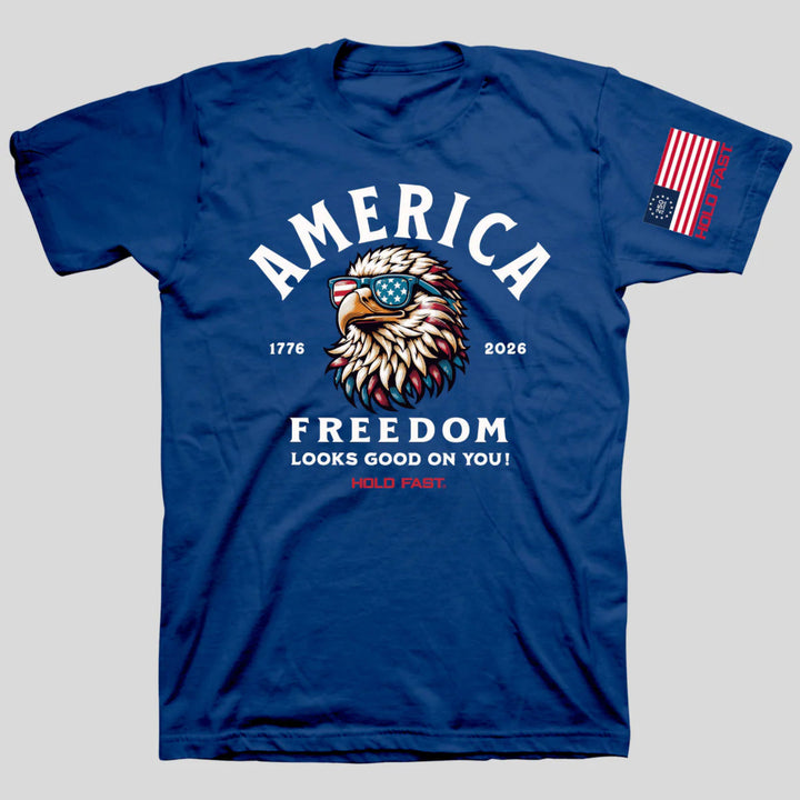 Blue t-shirt with an eagle graphic and text on a gray background