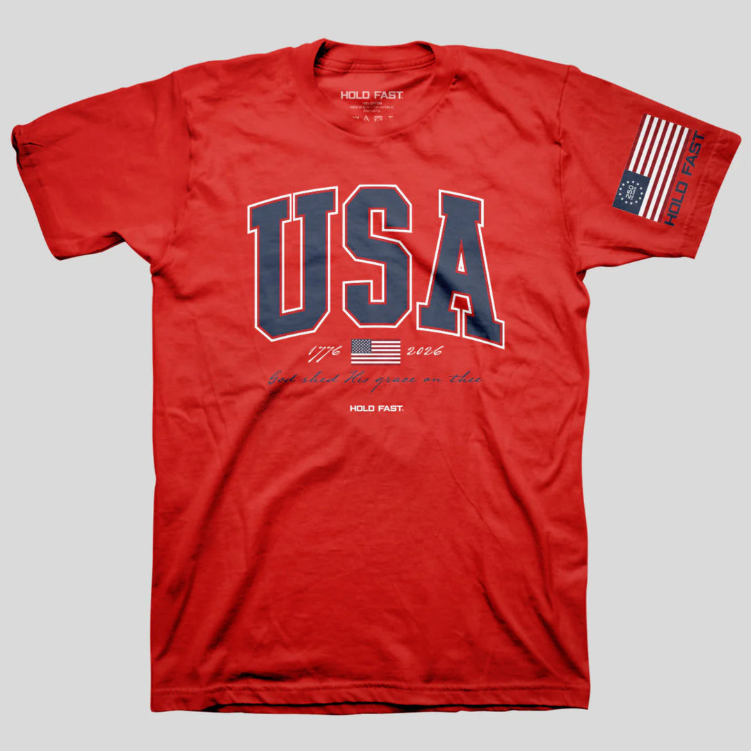 Red t-shirt with 'USA' text and American flag design on a gray background
