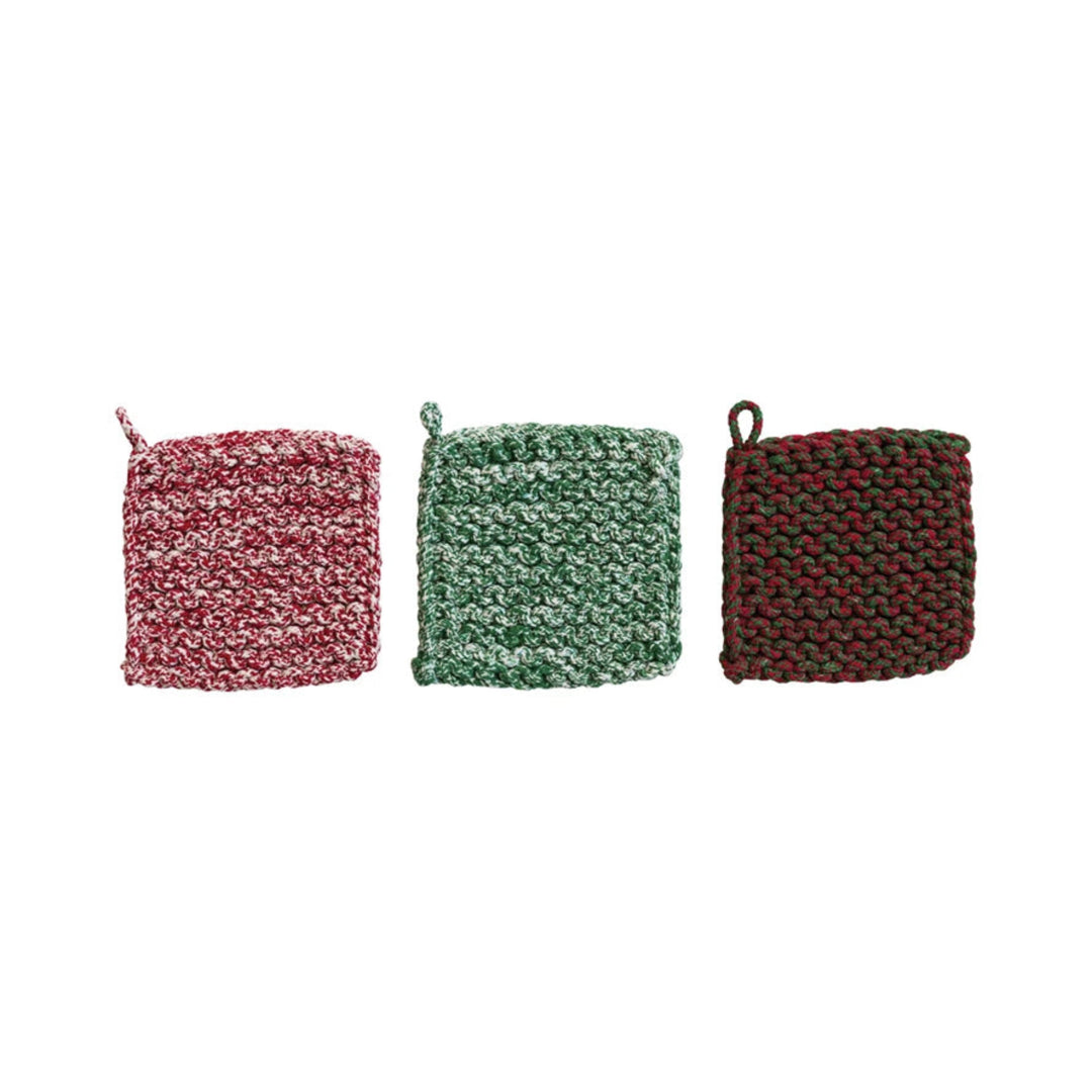 Three woven potholders in red, green, and brown on a white background