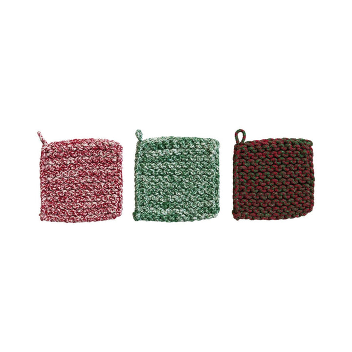 Three woven potholders in red, green, and brown on a white background