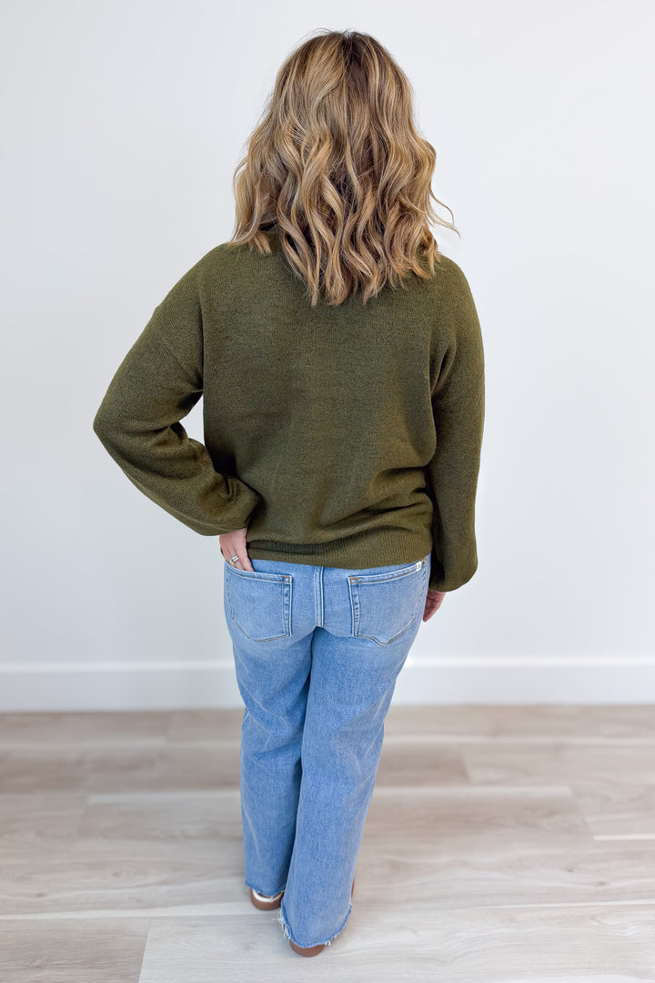 Far From It Sweater