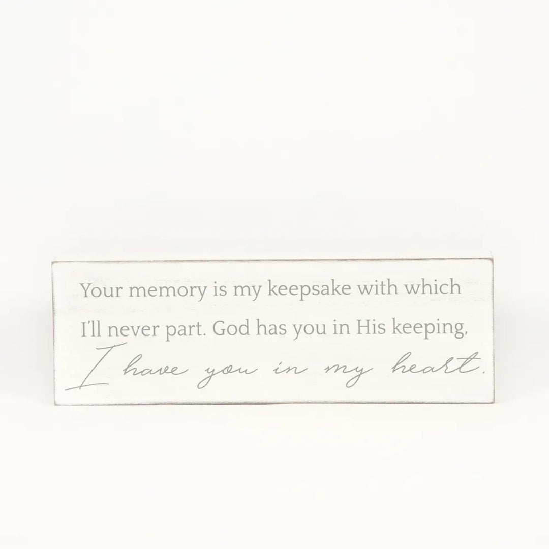 Memorial plaque with a quote on a white background