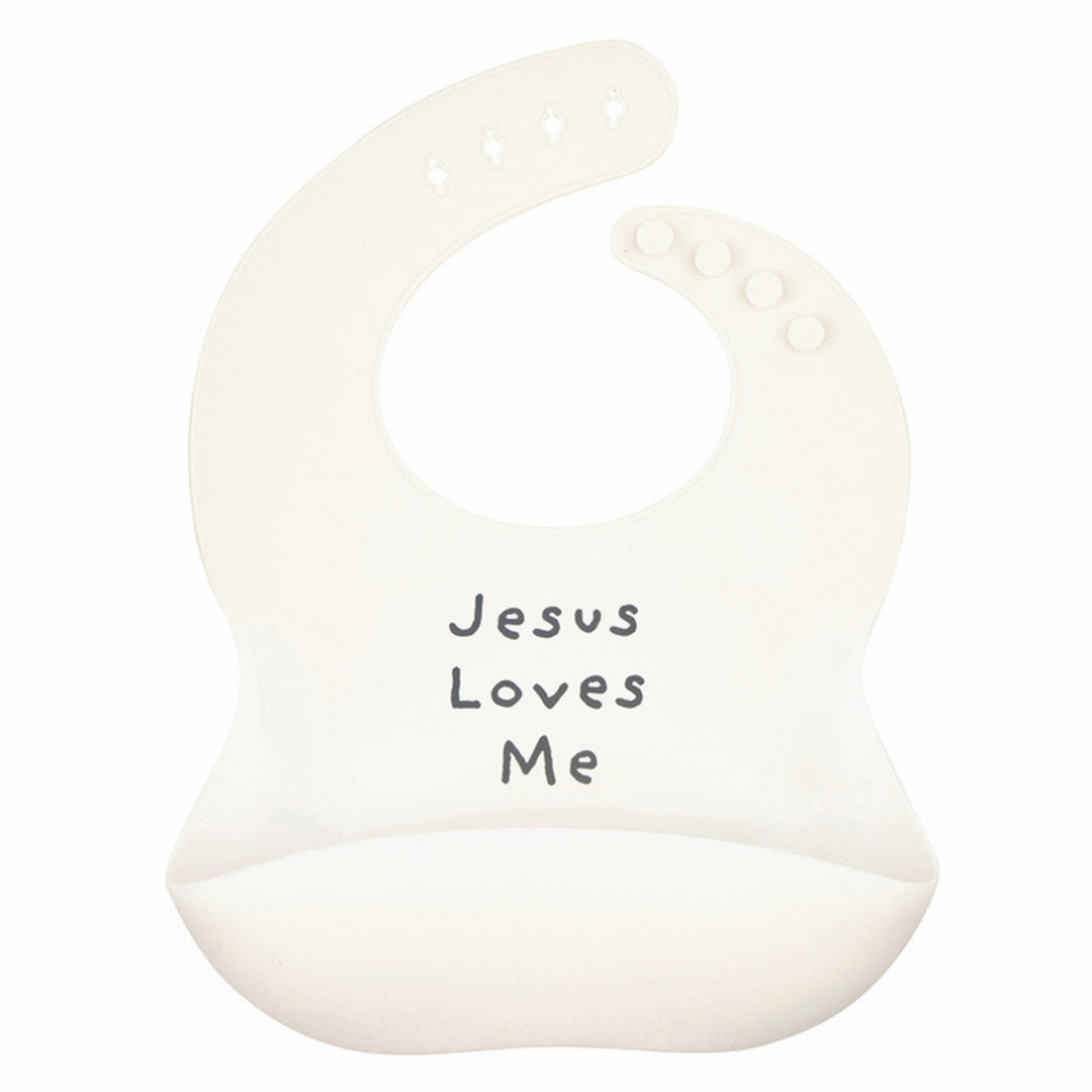 White bib with 'Jesus Loves Me' text on a white background