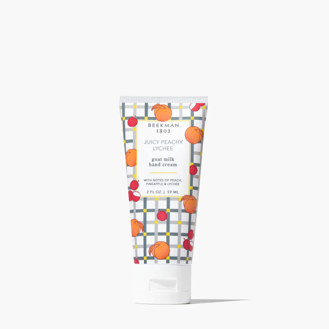 Beekman 1802 hand cream tube with colorful packaging on a white background
