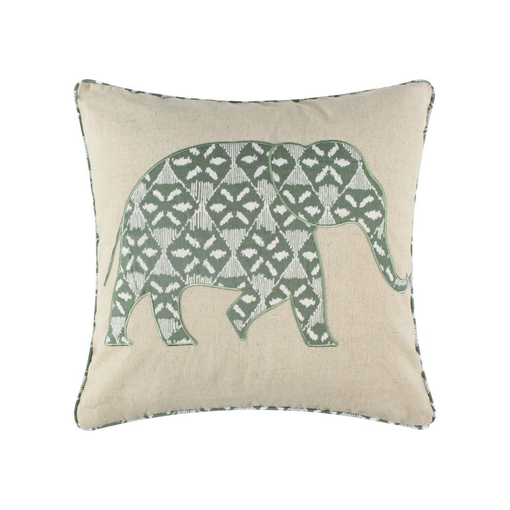 Decorative pillow with a green elephant pattern on a beige background