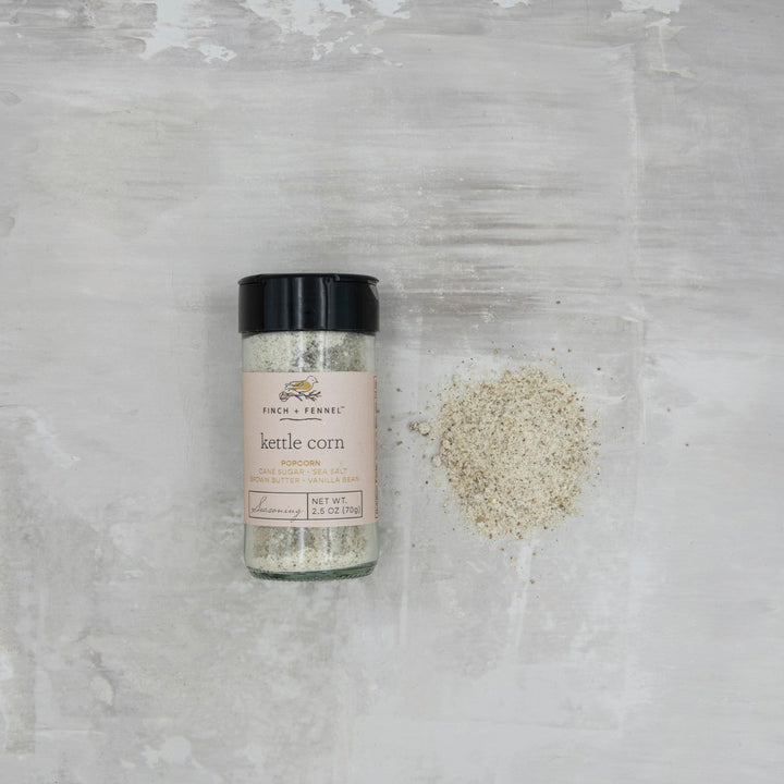 Jar of 'Kettle Corn' seasoning on a textured gray surface