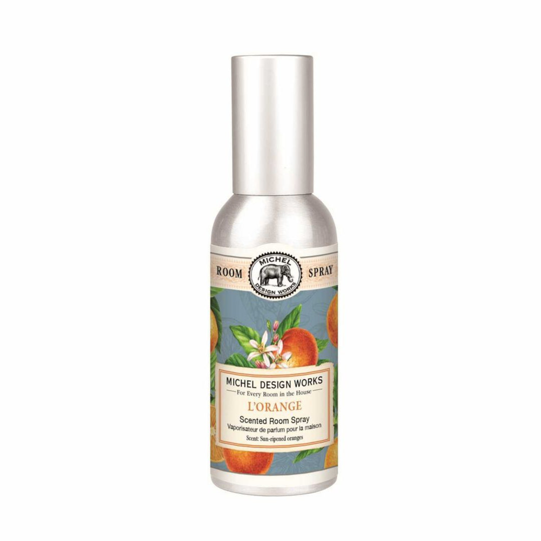 Room spray bottle with colorful label featuring oranges on a white background