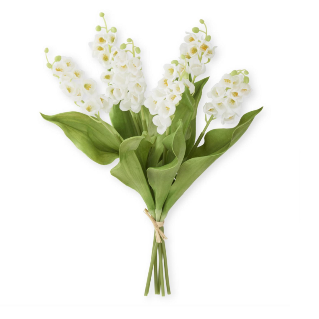 Bouquet of white flowers with green leaves on a white background