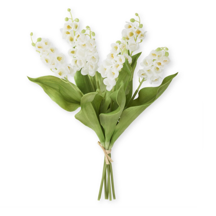 Bouquet of white flowers with green leaves on a white background