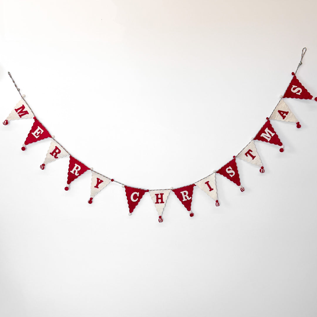 Red and white 'Merry Christmas' banner on a white background