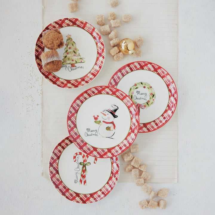 Set of Christmas-themed coasters with decorative elements on a white surface.