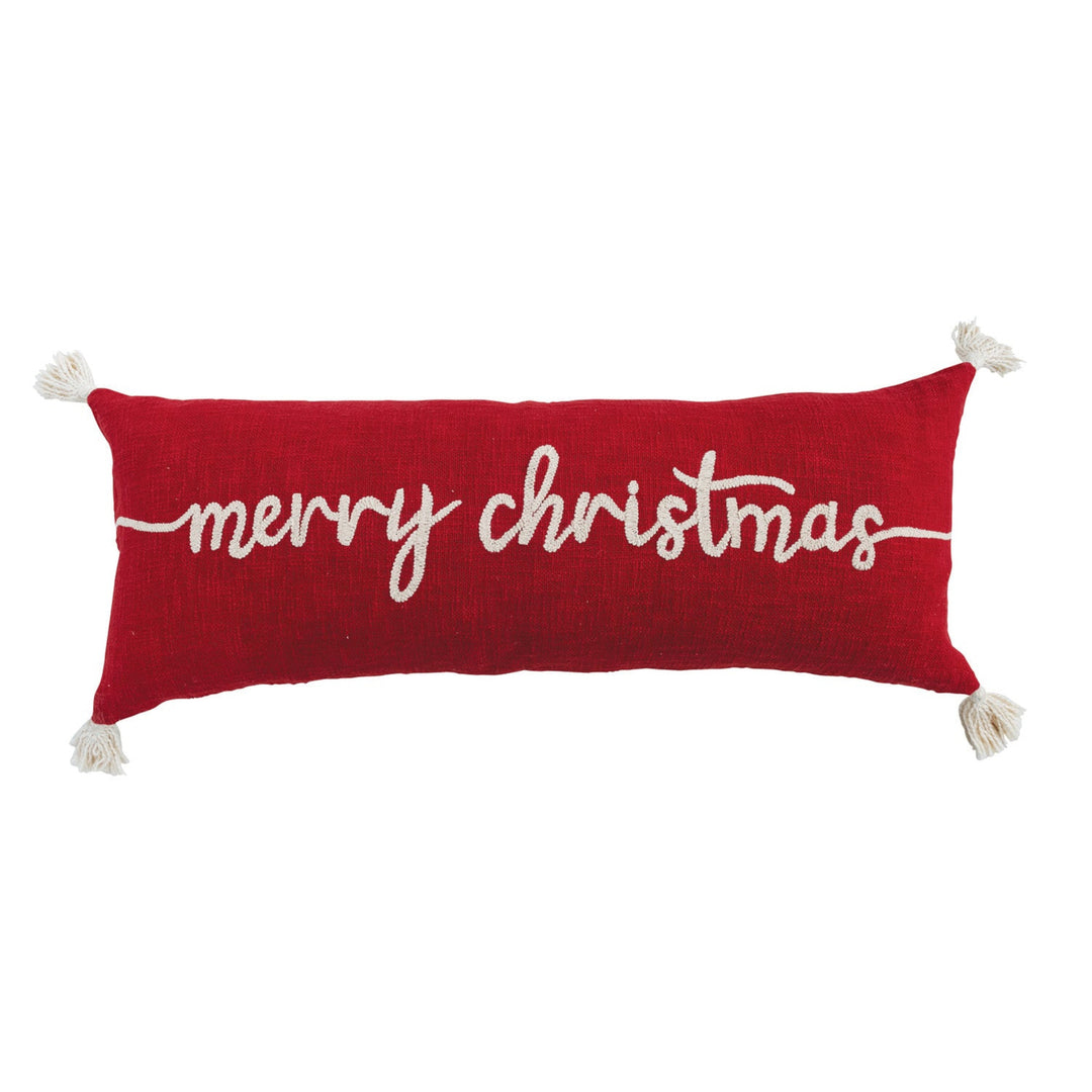 Red pillow with 'merry christmas' text on a white background