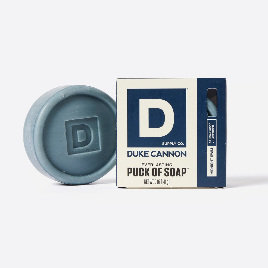 Duke Cannon soap puck and packaging on a white background