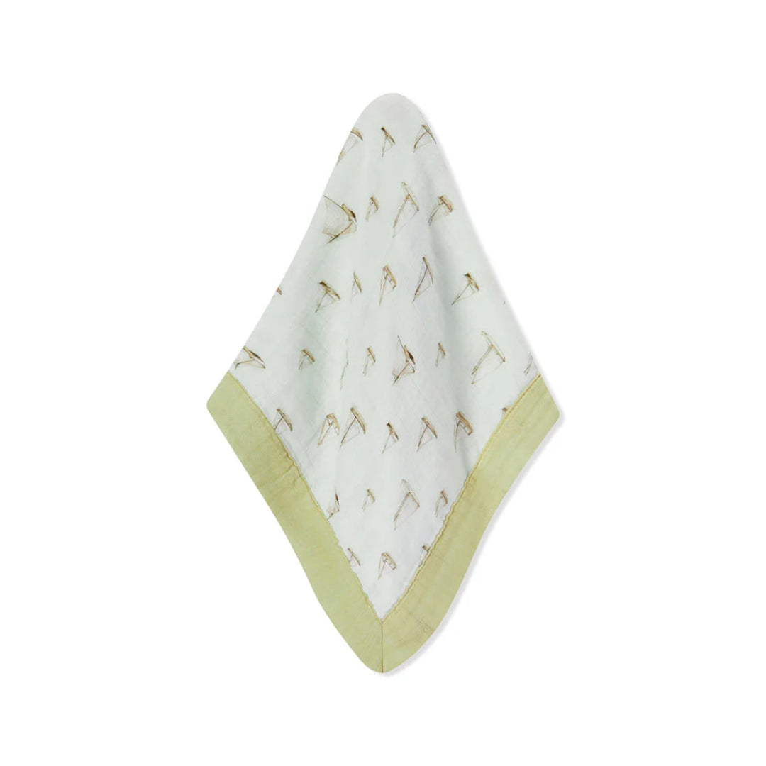 Baby blanket with giraffe pattern on a white background