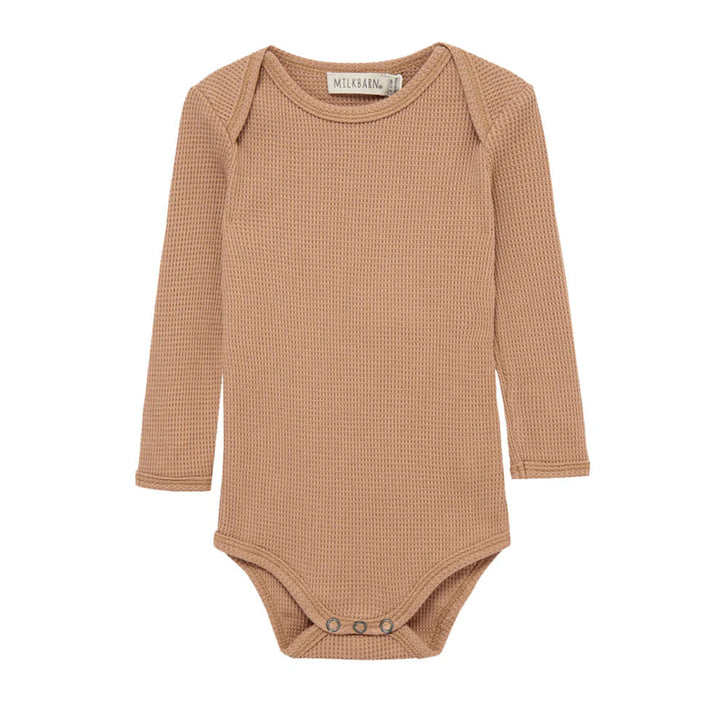 Brown baby bodysuit with 'MilkBarn' label on a white background