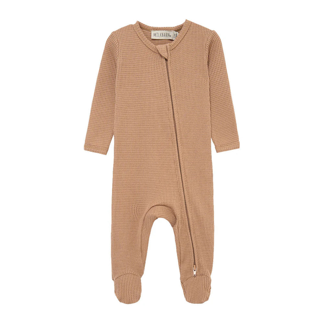 Brown baby onesie with a zipper on a white background