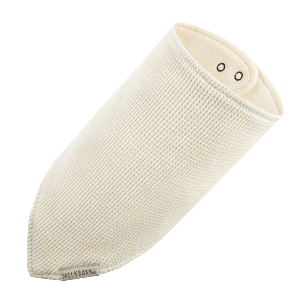 Beige baby wrap with 'Milkbarn' branding on a white background