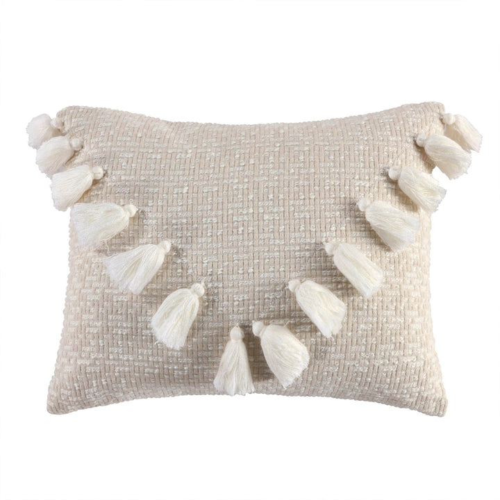 Decorative pillow with tassels on a white background
