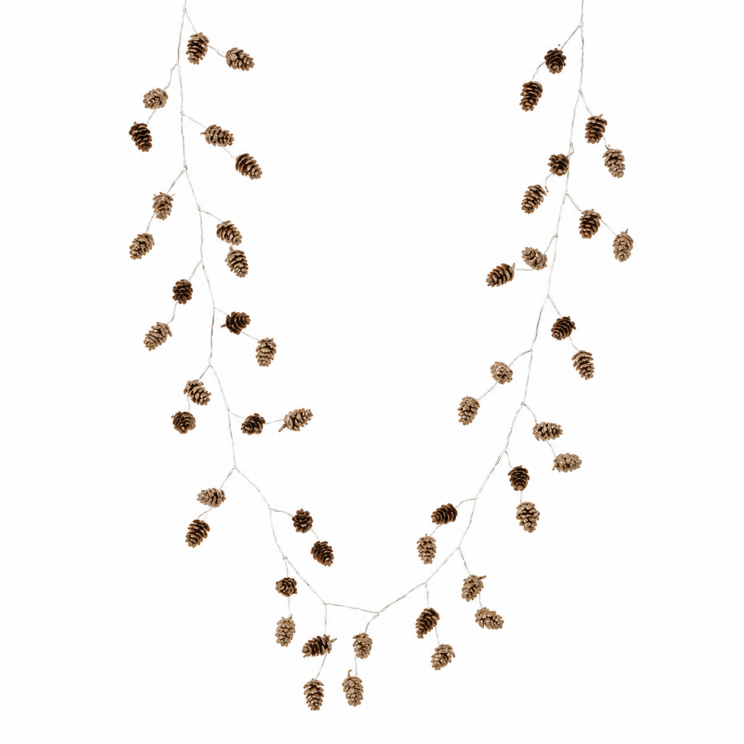Pinecone garland with small brown pinecones attached to thin white strings, arranged in a draped V-shape on a plain white background.