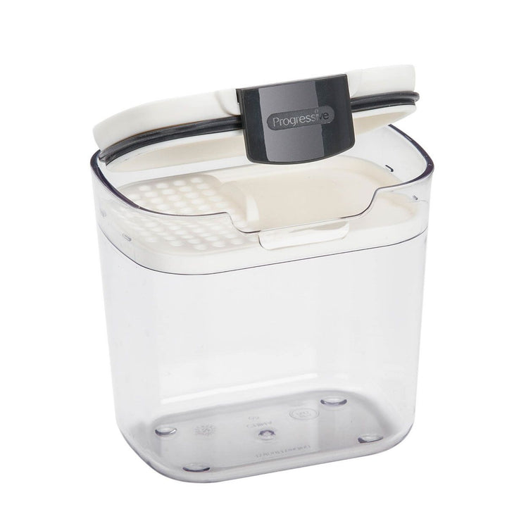 Clear plastic container with a white lid featuring a brand logo on a white background