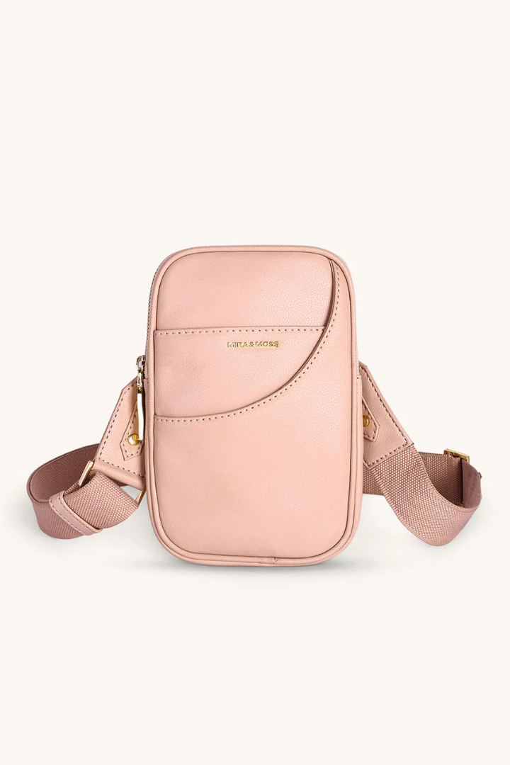 Pink crossbody bag on a white background