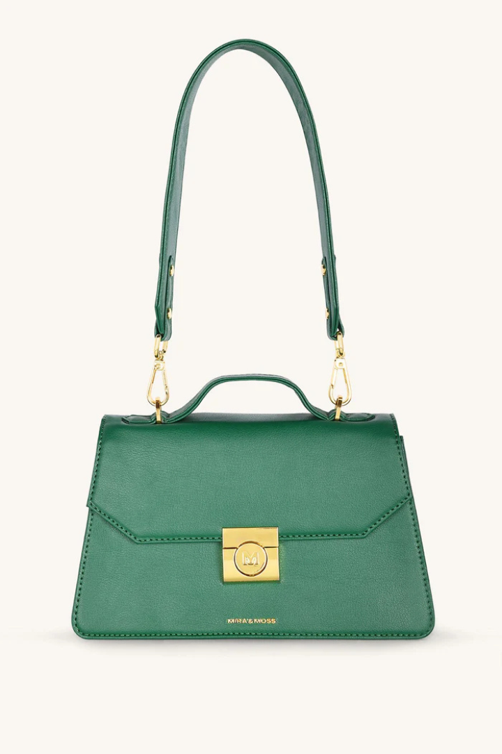 Green handbag with a gold clasp on a white background