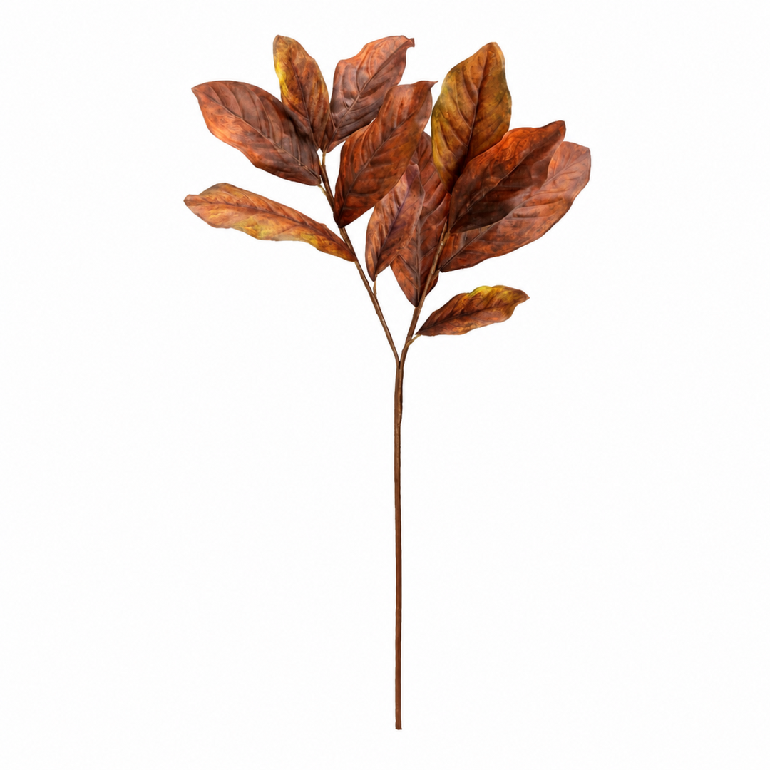 An artificial autumn magnolia branch with realistic brown, orange, and yellow leaves on a thin brown stem, isolated on a white background.