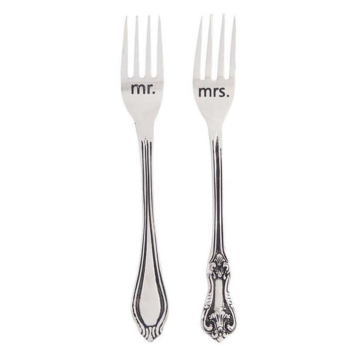 Two silver forks, one labeled 'Mr.' and one labeled 'Mrs.', on a white background.