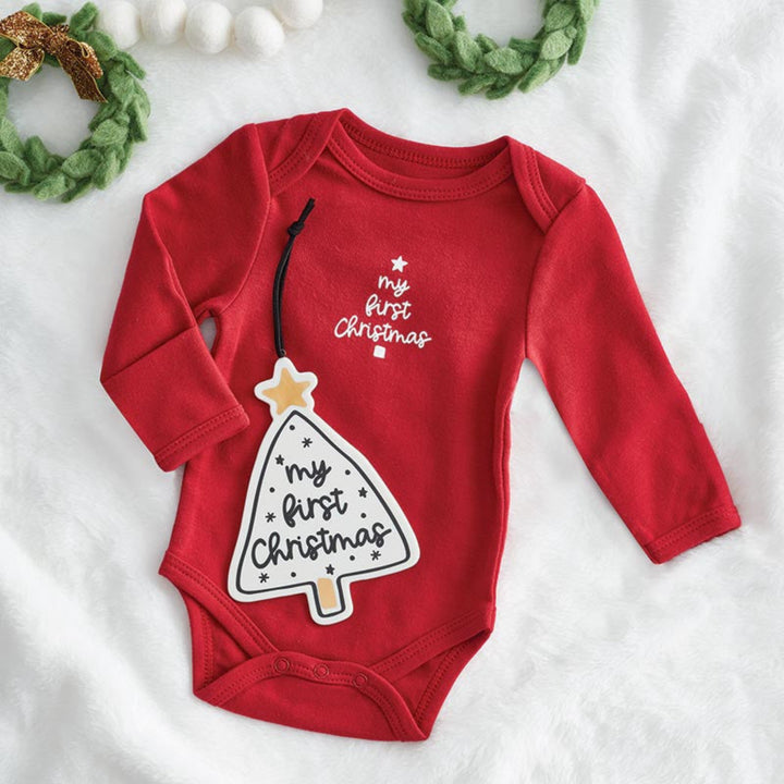 Red baby onesie with Christmas tree design and text on a white background