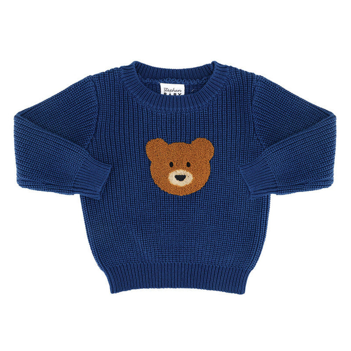 A navy blue ribbed knit baby sweater featuring a brown teddy bear face motif on the chest, displayed flat against a white background.
