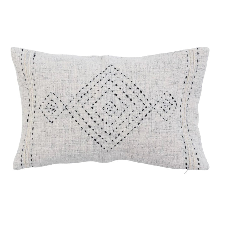Decorative pillow with geometric pattern on a white background