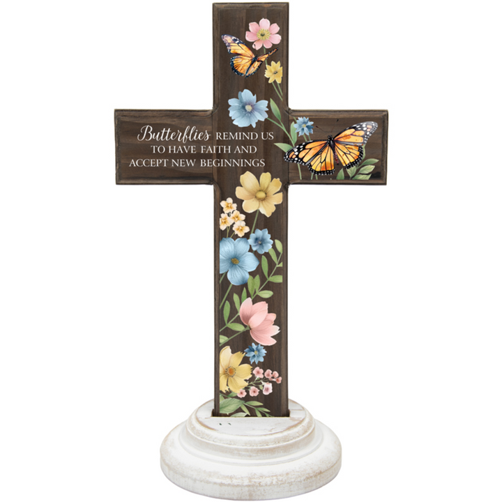 Decorative cross with butterflies and flowers on a white background