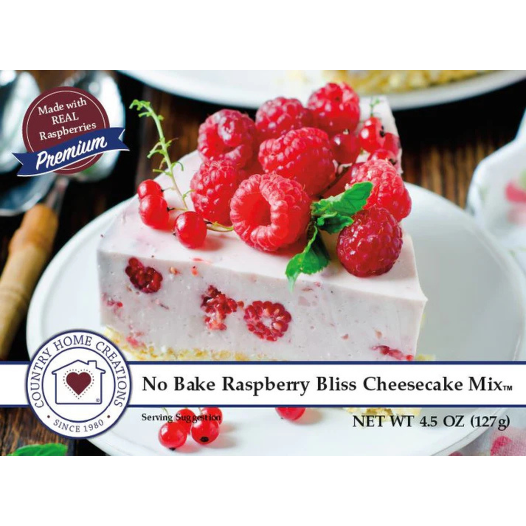 No Bake Raspberry Bliss Cheesecake Mix with raspberries on top, featuring Country Home Creations branding.