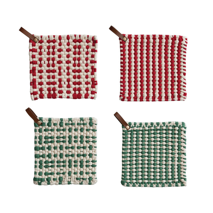Four woven coasters with different patterns and colors on a white background.