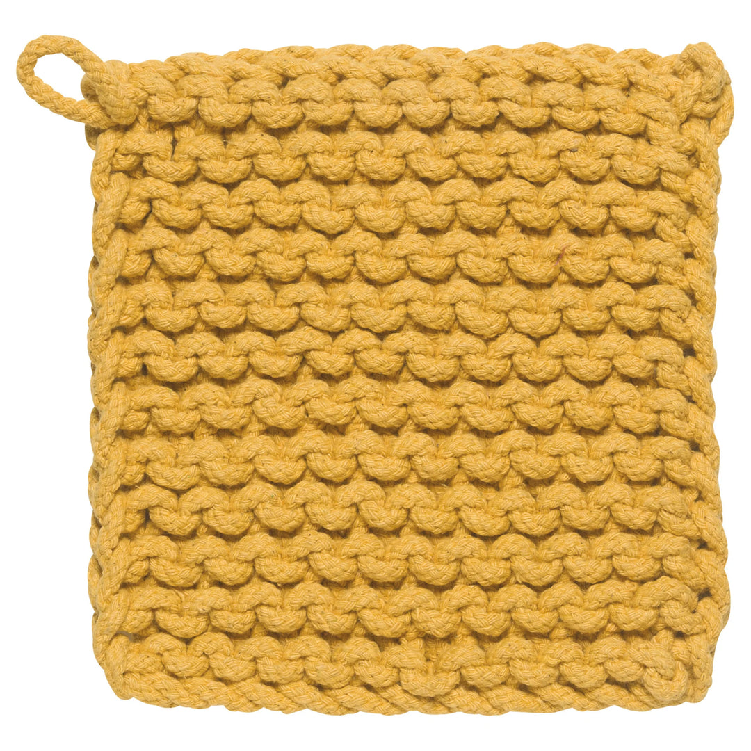 Yellow knitted pot holder on a white background
