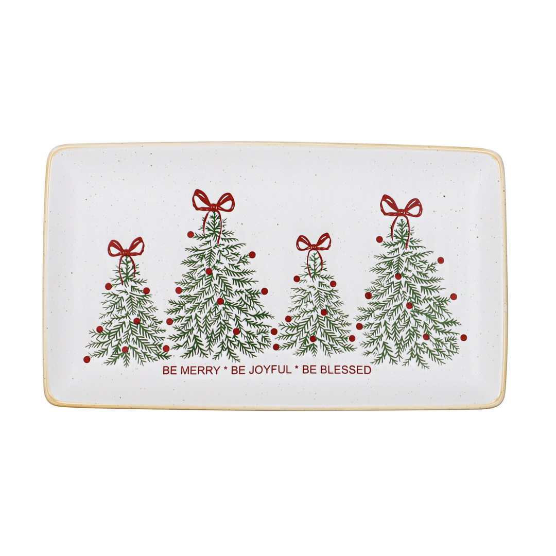 A rectangular ceramic holiday serving tray with rounded corners, featuring four decorated Christmas trees in green with red bows and berries on a white background. The text 'BE MERRY * BE JOYFUL * BE BLESSED' is printed in red below the trees.
