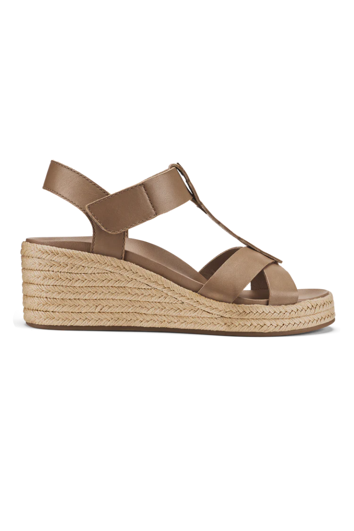 A single women's wedge sandal in taupe brown faux leather with a braided jute platform sole, shown from a side profile on a white background.