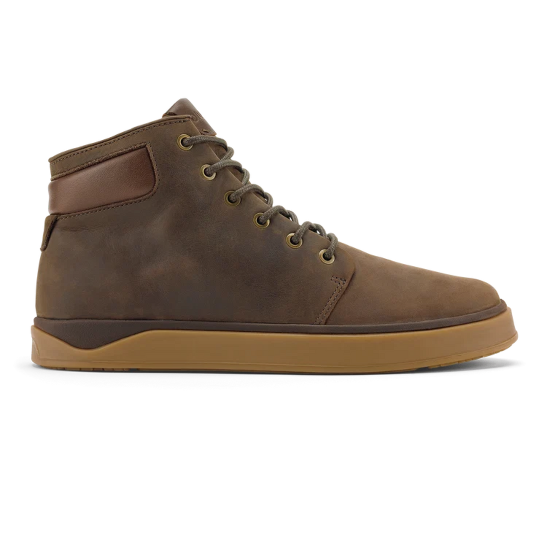 A brown high-top leather shoe with a gum sole, shown in a side profile view against a white background.