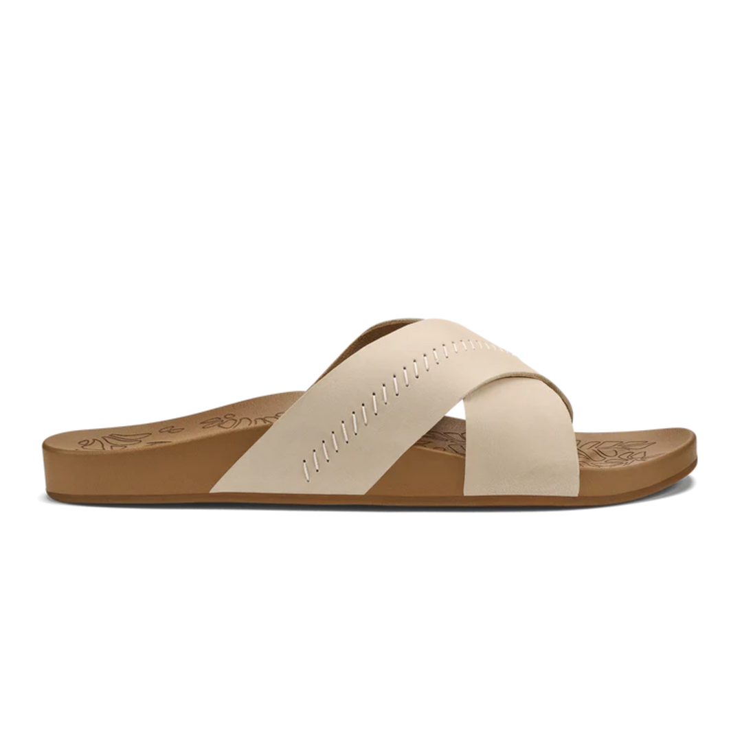 Beige sandal with a cross strap on a white background