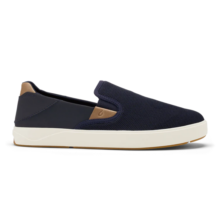 Navy slip-on shoe with white sole on a white background