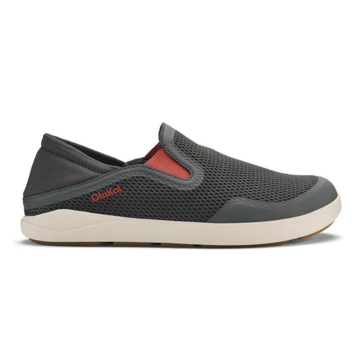 Gray slip-on shoe with red lining on a white background