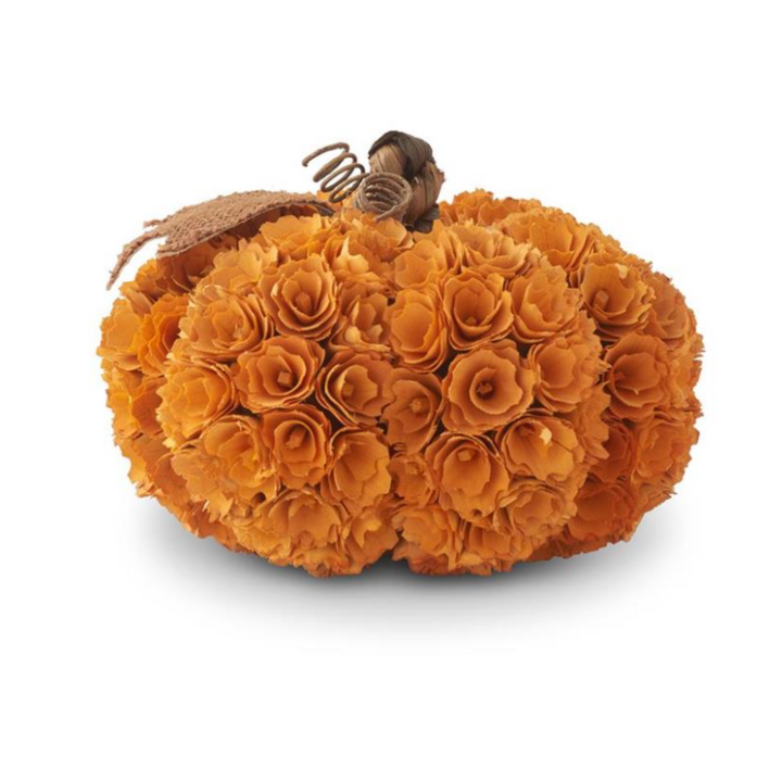 Decorative pumpkin made of orange flowers on a white background
