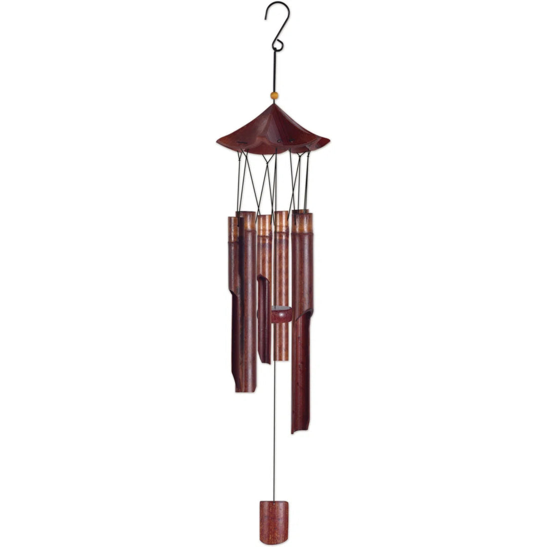 Bamboo wind chime with a wooden top on a white background