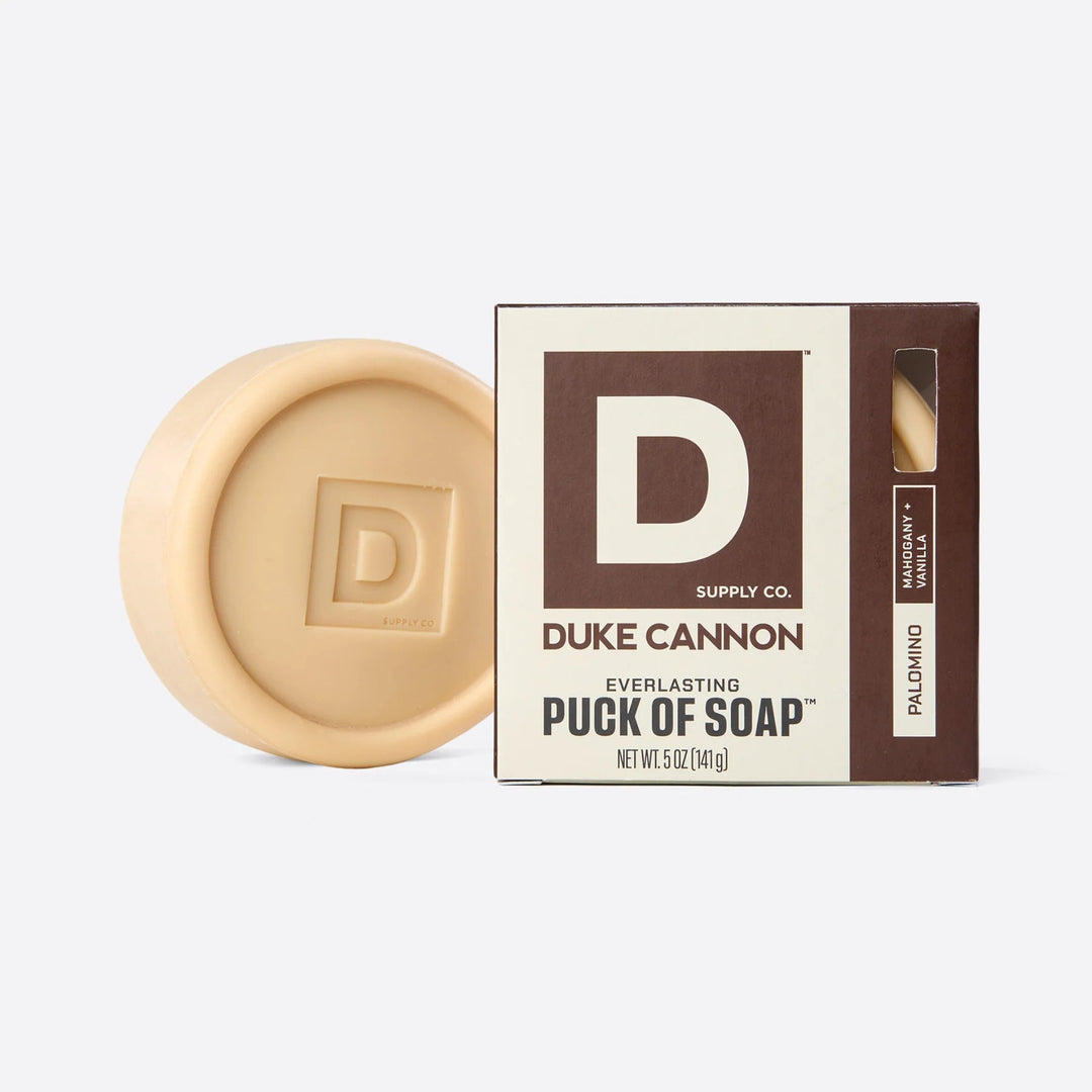 Duke Cannon soap puck and packaging on a white background