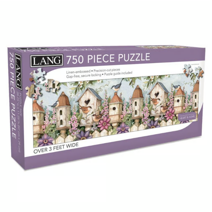 Lang 750-piece birdhouse-themed puzzle box on a white background, showing illustrated wooden birdhouses with flowers and a lavender border.