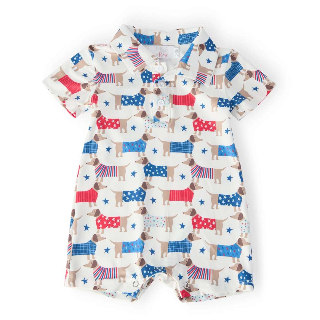 Children's dress with dog and flag pattern on a white background