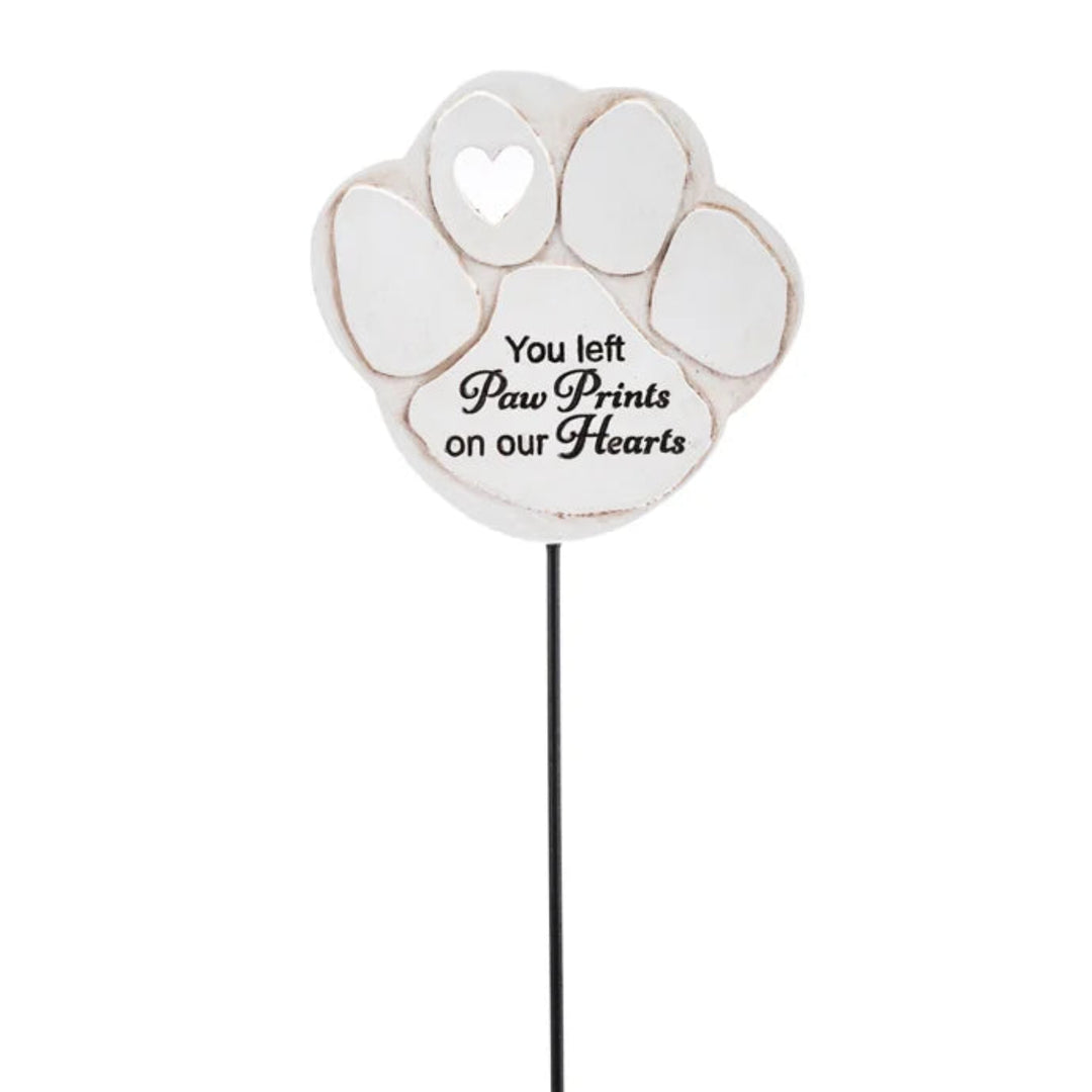 Decorative garden stake with paw prints and text on a white background
