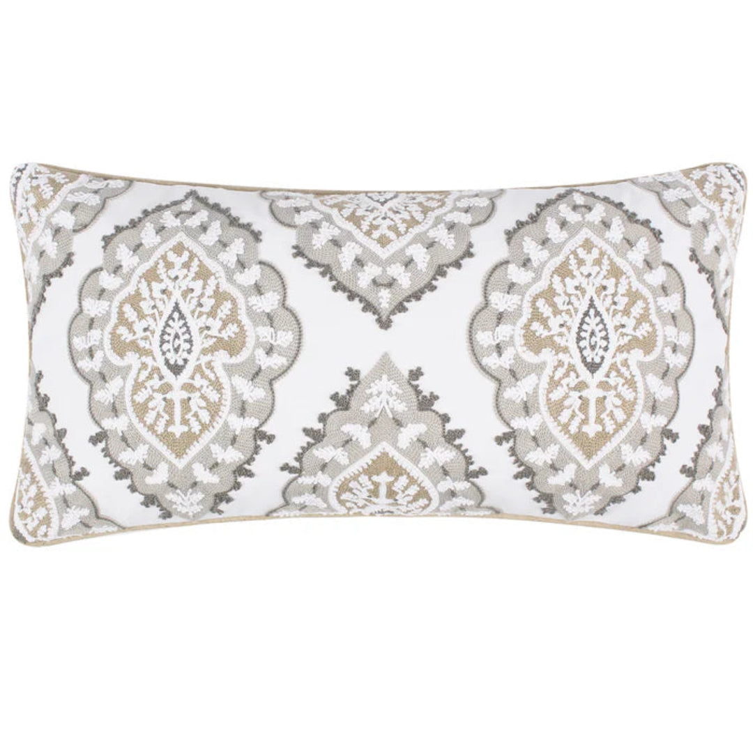 A rectangular lumbar throw pillow featuring a white background with a detailed beige, gray, and white damask pattern, finished with a thin beige piping border.