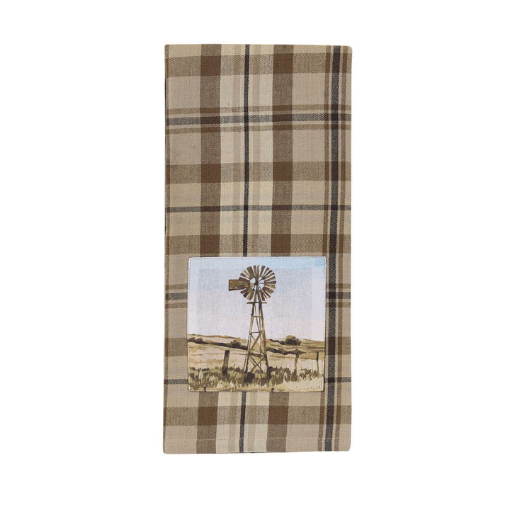 Plaid towel with a windmill design on a white background