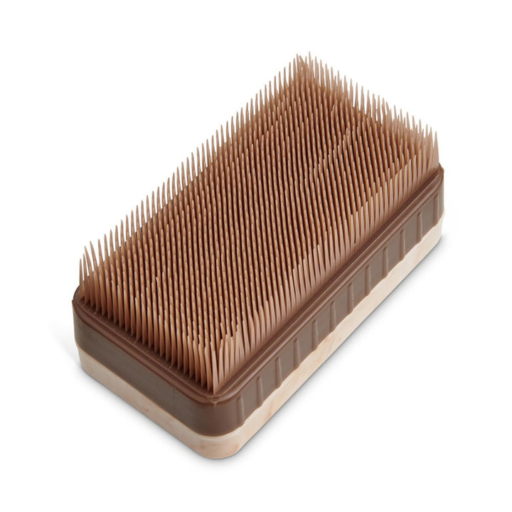 Rectangular brush with brown bristles on a white background